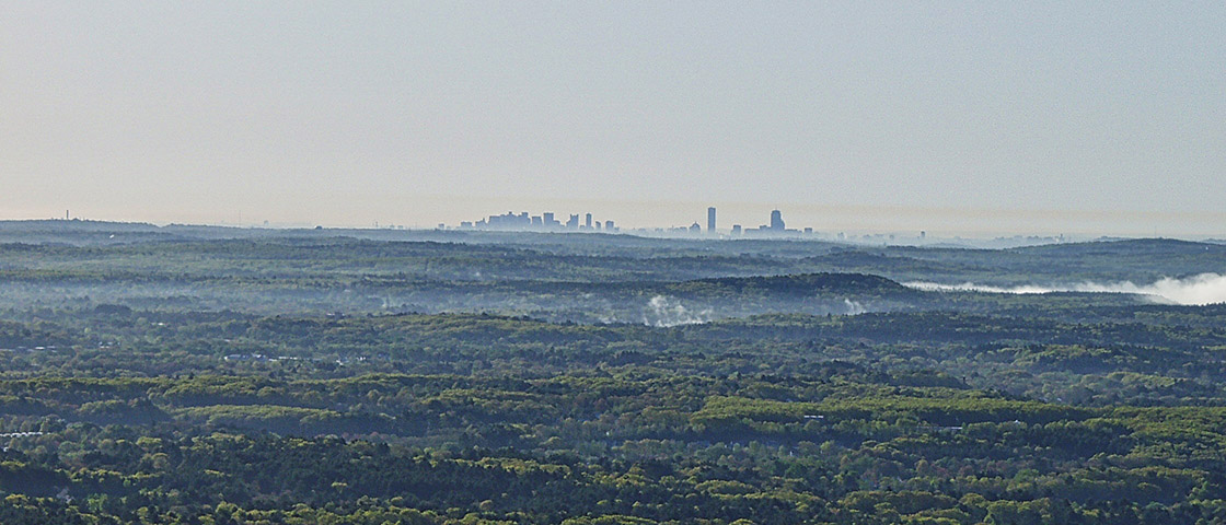 Boston Skyline as seen from launch in Stow, MA